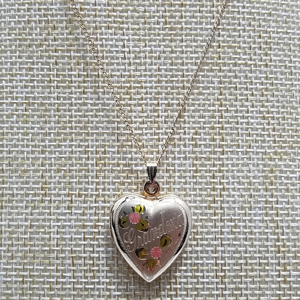 14KGF heart locket with chain.